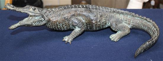 A large 20th century bronze model of a crocodile, 15.5in.